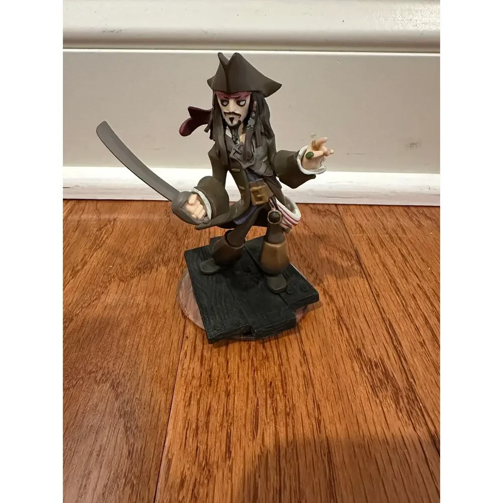 Disney Infinity figures Jack Sparrow, Monsters Inc, and Wreck it Ralph